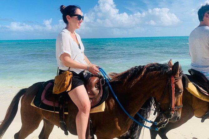 60-Minute Private Horseback Riding Experience in Turks and Caicos - The complimentary photoshoot, with one important caution