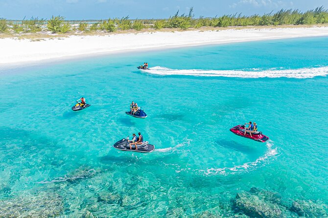 FAMOUS SHIPWRECK, Tiki Bar & Iguana Island Private Jet Ski Tour - La Famille Express and the 25-foot jump