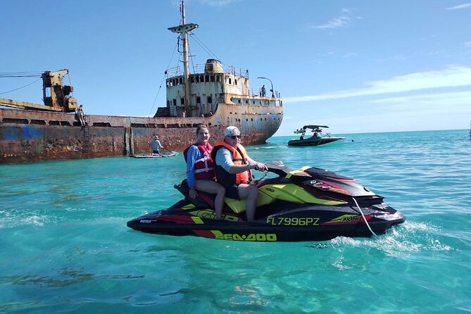 FAMOUS SHIPWRECK, Tiki Bar & Iguana Island Private Jet Ski Tour - Noah’s Ark Beach Club and the floating tiki bar