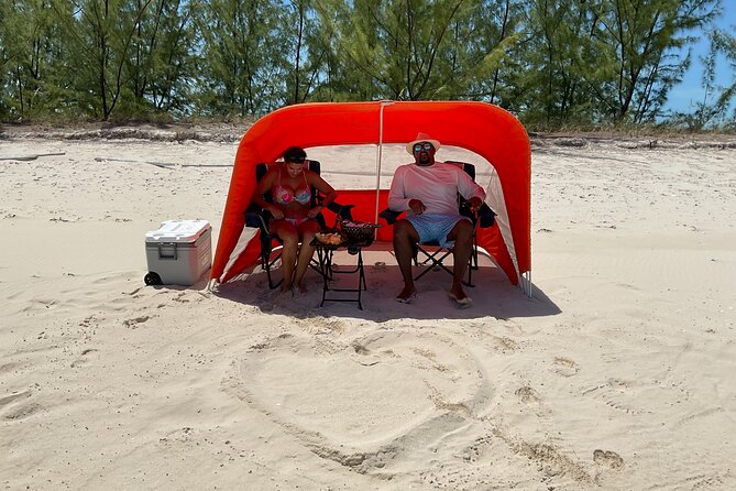 Full-Day Private Island Getaway in the Turks and Caicos Islands - Clear water, snorkeling gear, and time to swim
