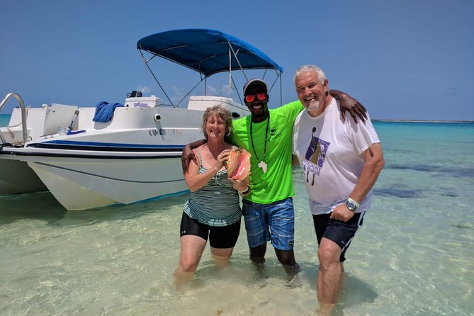 Gibbs Cay Stingray and Conch Dive Adventure - Meeting the southern stingrays in shallow water