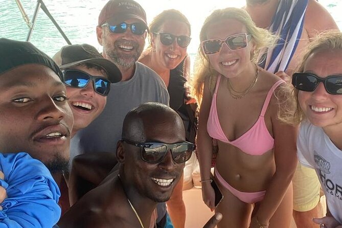 Group Catamaran 4 hr tour coral reef fun Iguana island adventure! - Rooftop loungers and views across Providenciales