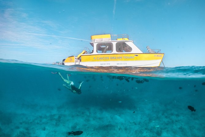 Half Day Private Boat Charter at Grace Bay, Providenciales - Cruising out from Grace Bay Beach