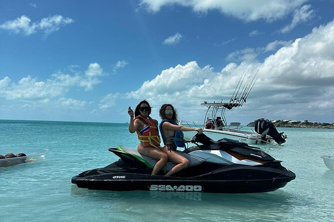 Jet Ski Tour or Jet Ski Rental in Providenciales - Cliff jumping into clear water