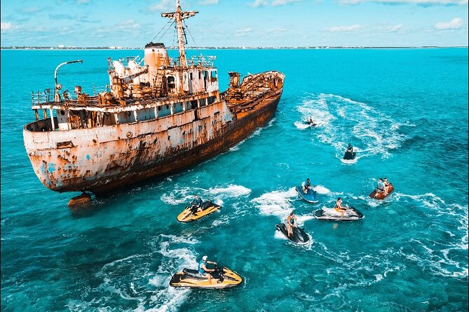 Jet Skiing around La famille ship and smaller pristine cays - Leaving Leeward for the open water
