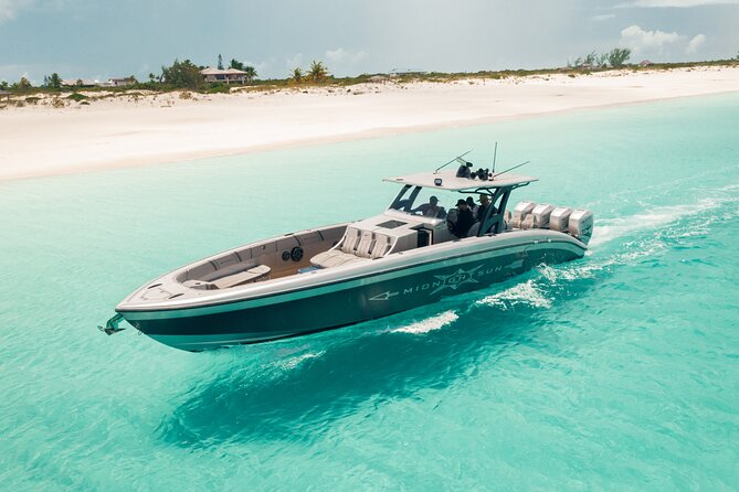Midnight Sun Charters - 43ft Midnight Express - Grace Bay Beach from the water