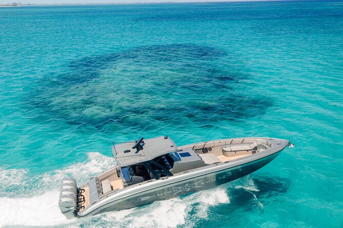 Midnight Sun Charters - 43ft Midnight Express - Noah’s Ark Beach Club brings food and drinks into the day