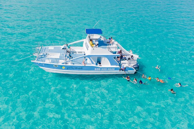 Private 4-Hour Catamaran Tour from Providenciales in Turks and Caicos - Sailing past Grace Bay Beach