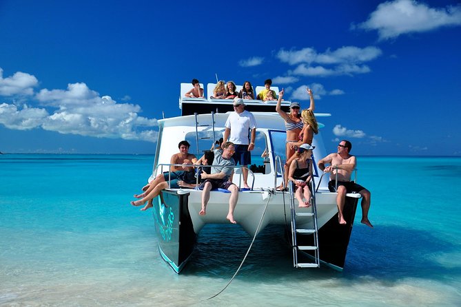 Private 4 Hour Power Catamaran Excursion in Grace Bay - Pickup at Grace Bay and the move to the catamaran