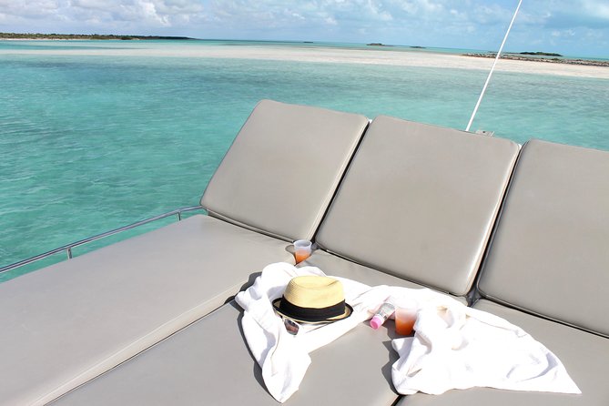 Private 4 Hour Power Catamaran Excursion in Grace Bay - Snorkeling, swimming, tubing, and the jump platform