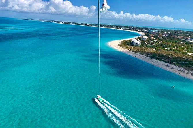 Private 4hr Parasail - Snorkel & Water-Sports Adventure, Turks and Caicos - Parasailing above Grace Bay