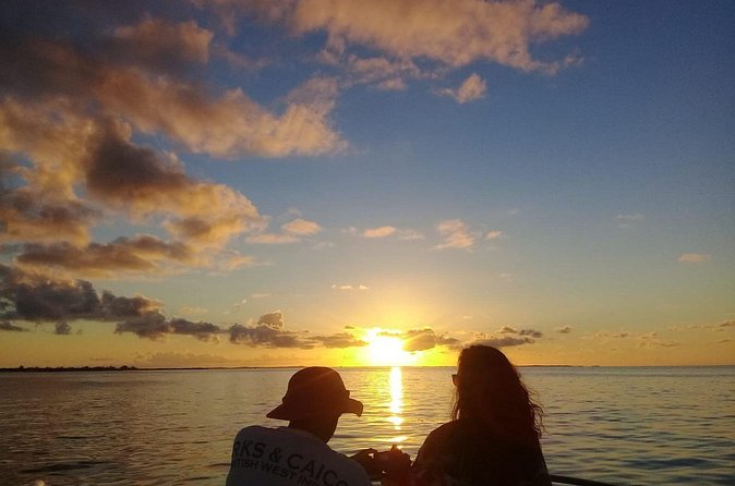 Private Sunset Cruise in Grace Bay - Sunset, cheese, rum punch, and music aboard