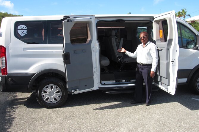 Shared Providenciales Airport Transfer (Round-Trip) - Meeting your driver after landing