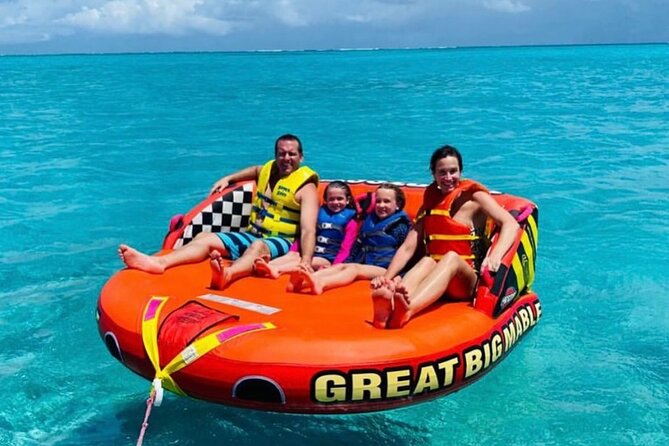 Tubing on grace bay beach Turks and caicos islands - Photos and Videos Give You More Than a Wet Memory
